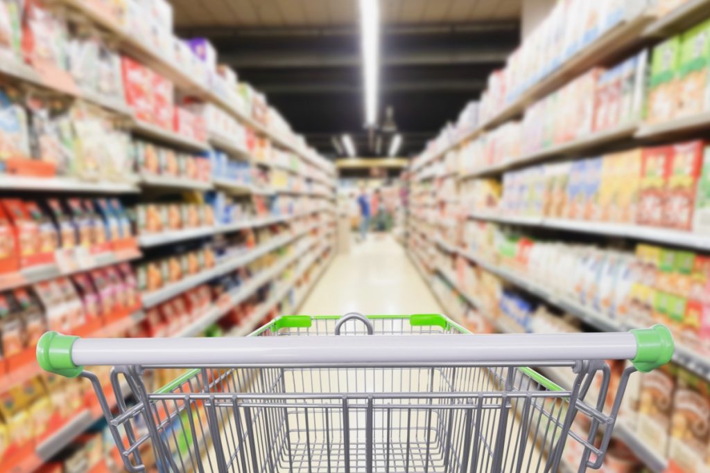 Shopping cart going down an aisle