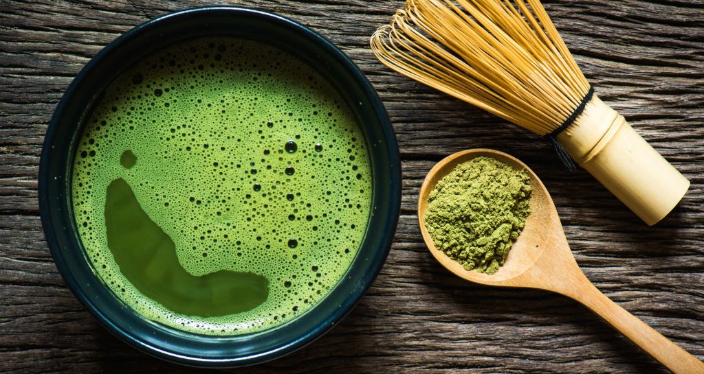 matcha tea with whisk