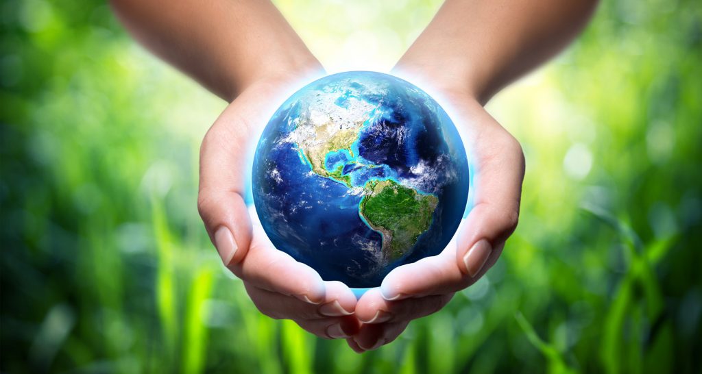 Hands holding earth