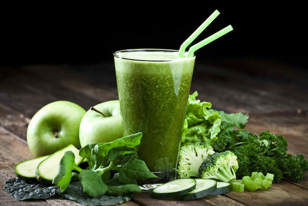 Green smoothie with ingredients
